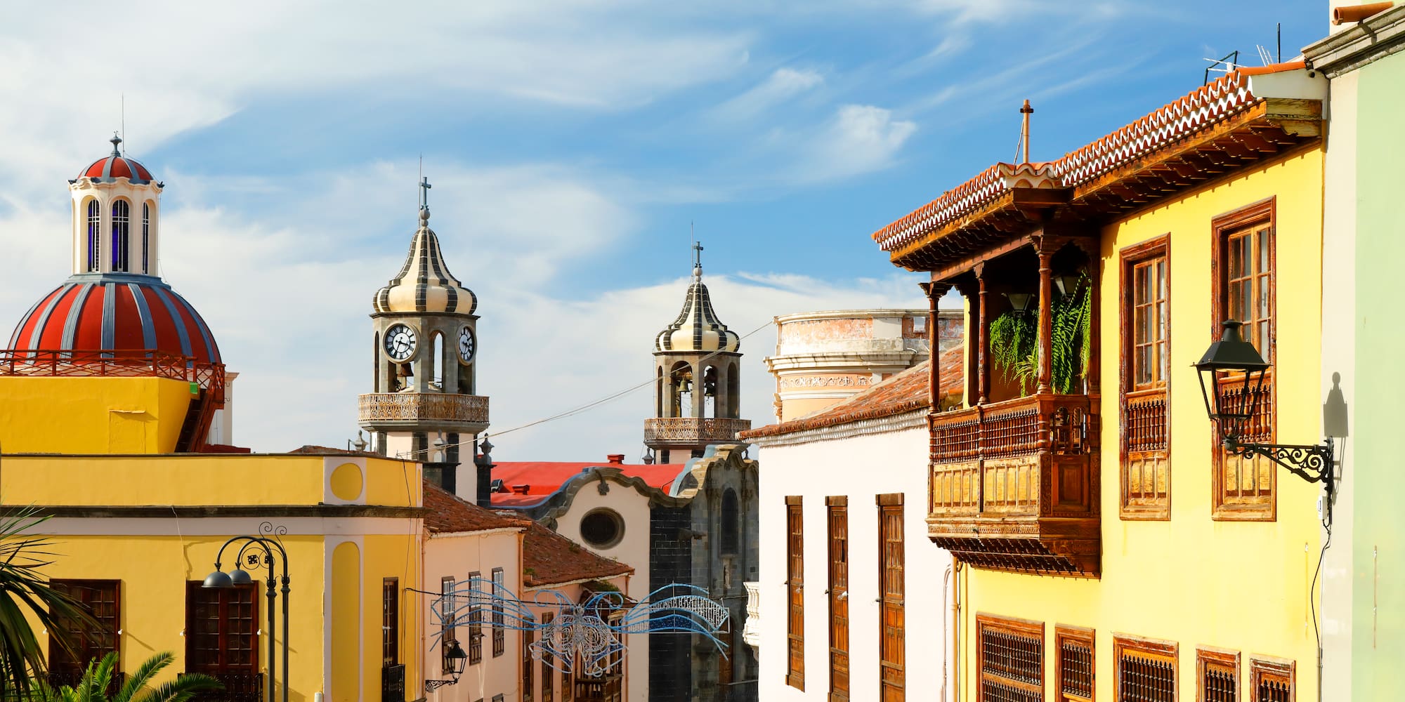 a street with buildings and a clock tower