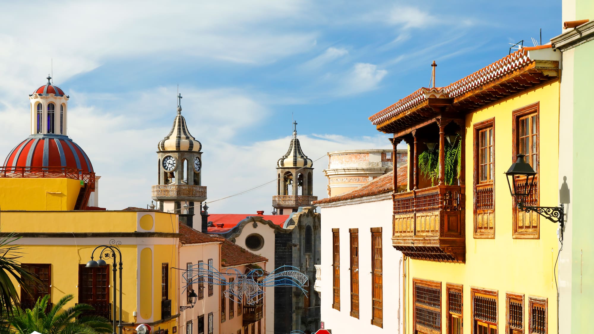 a street with buildings and a clock tower
