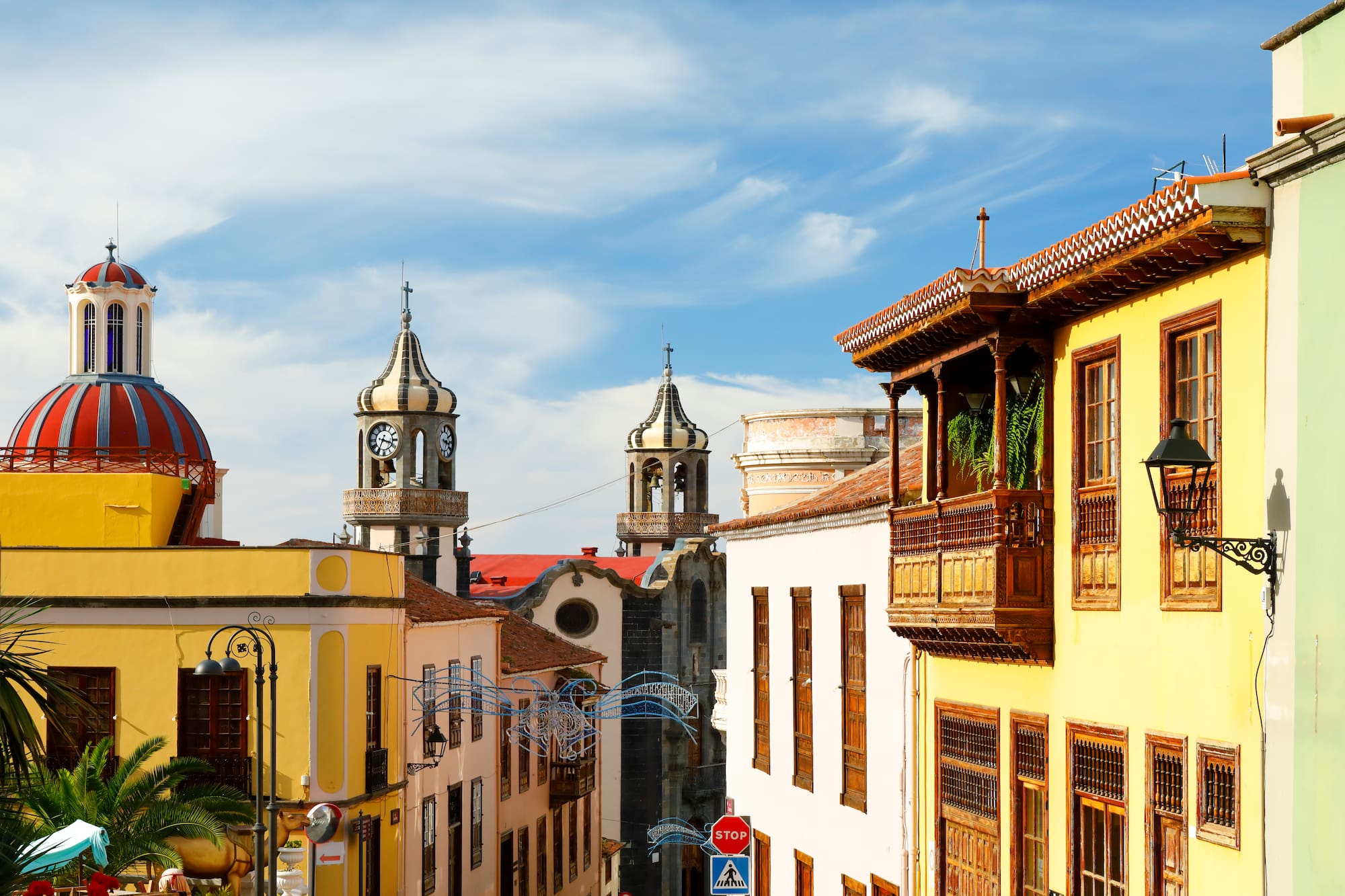 a street with buildings and a clock tower