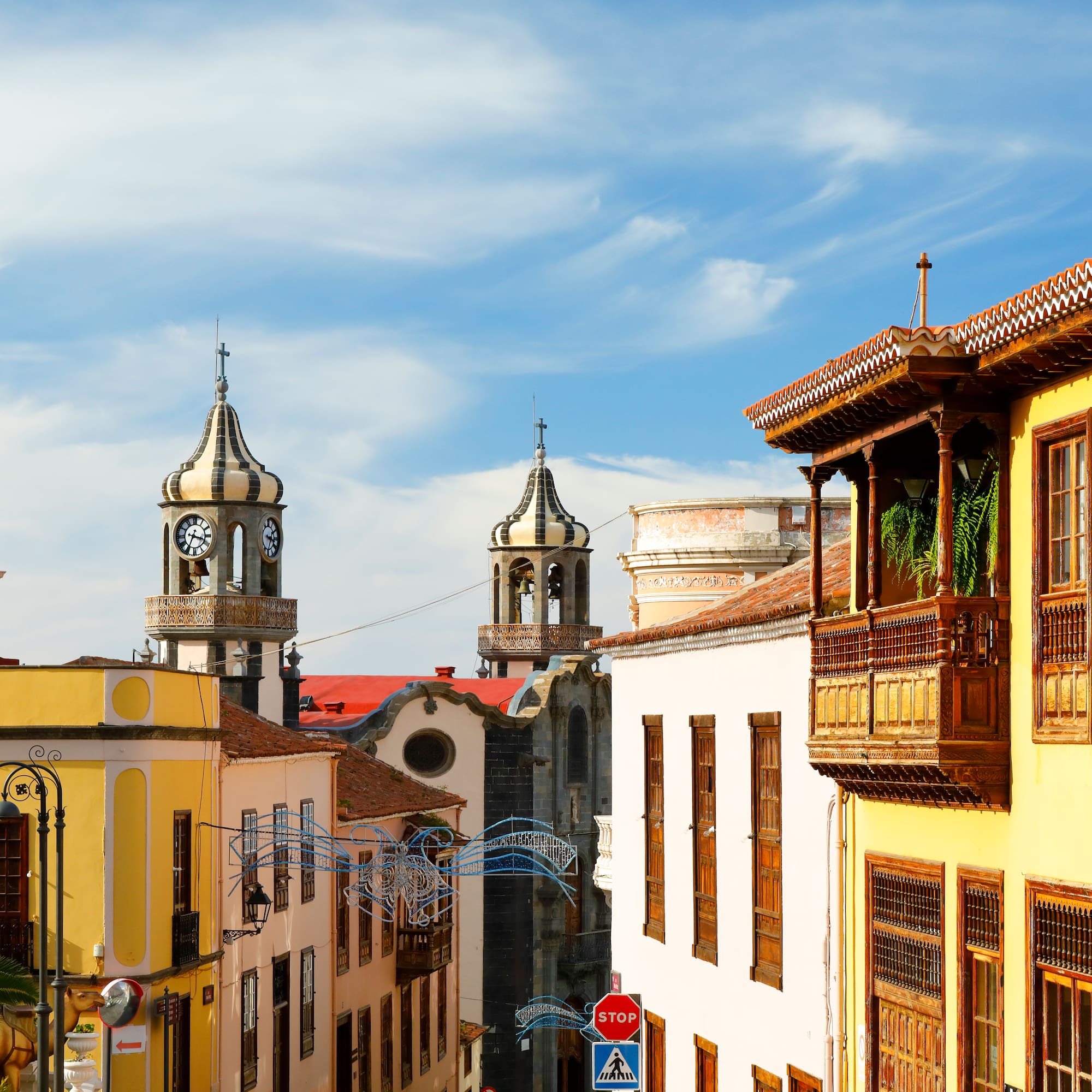 a street with buildings and a clock tower