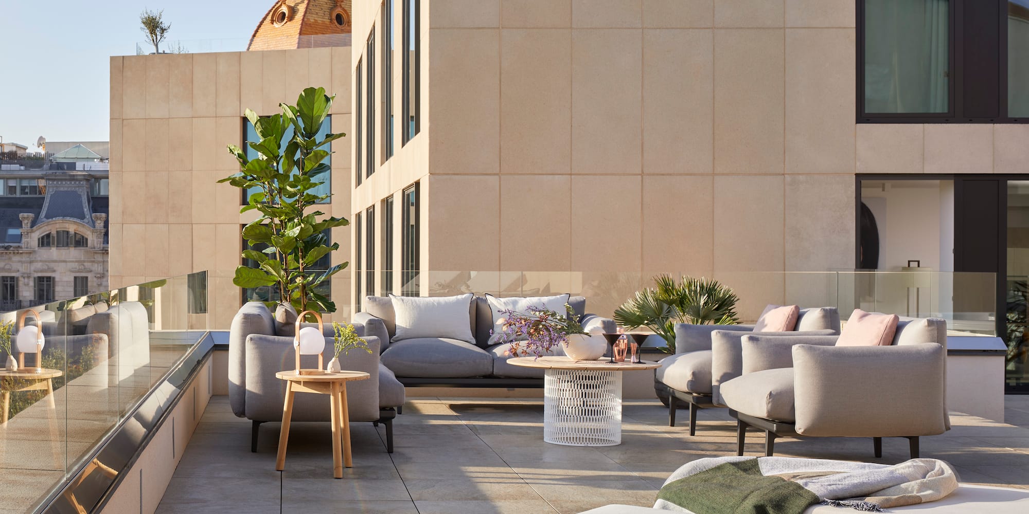 a patio with a couch and a table