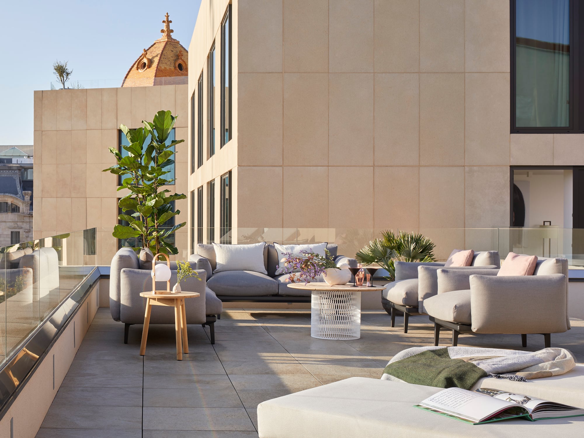 a patio with a couch and a table
