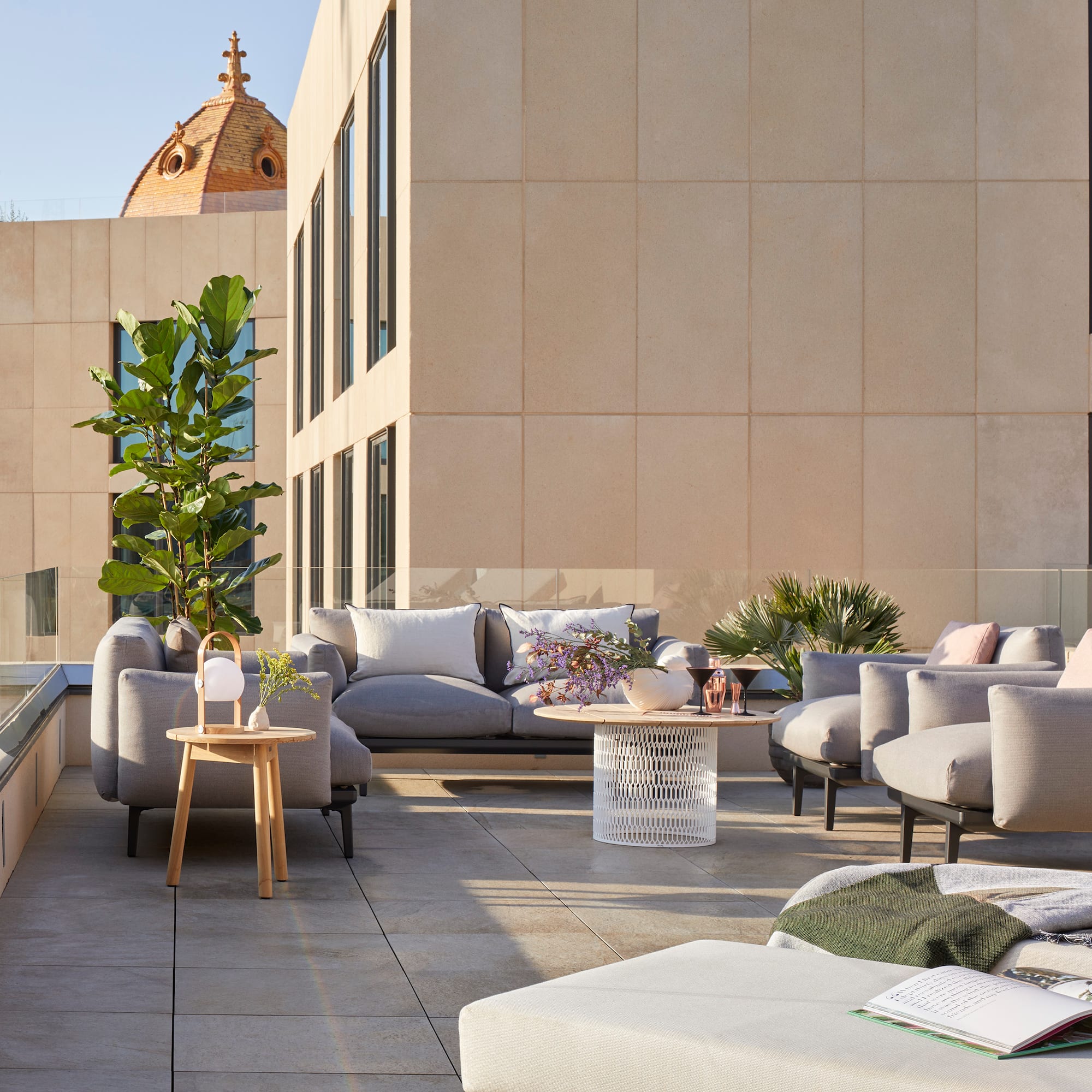 a patio with a couch and a table