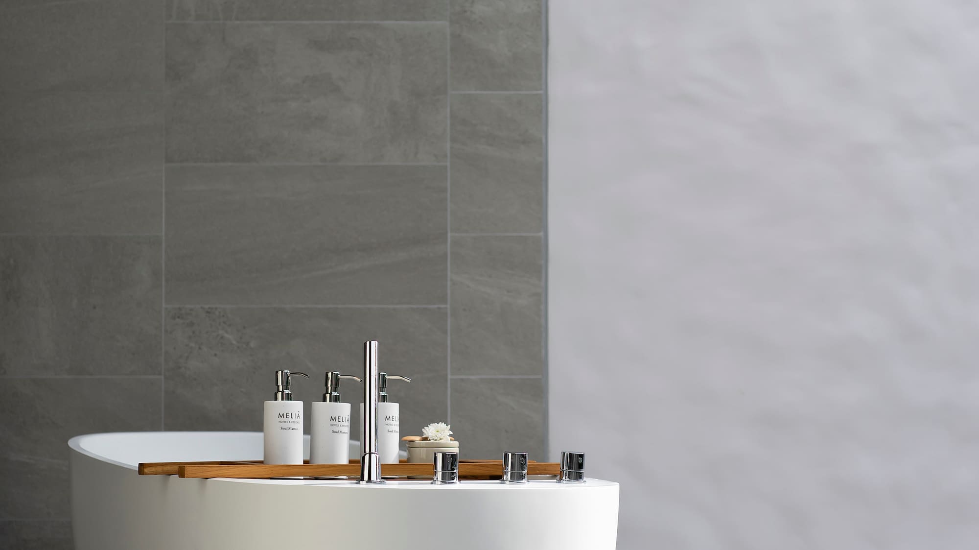 a bathtub with white tub and white walls