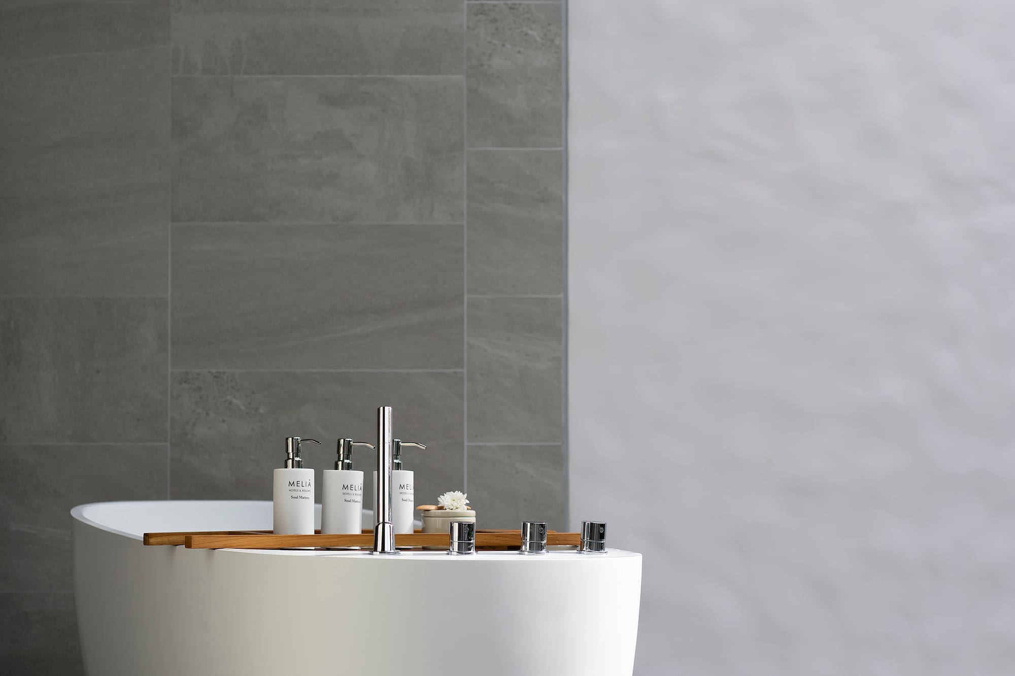 a bathtub with white tub and white walls