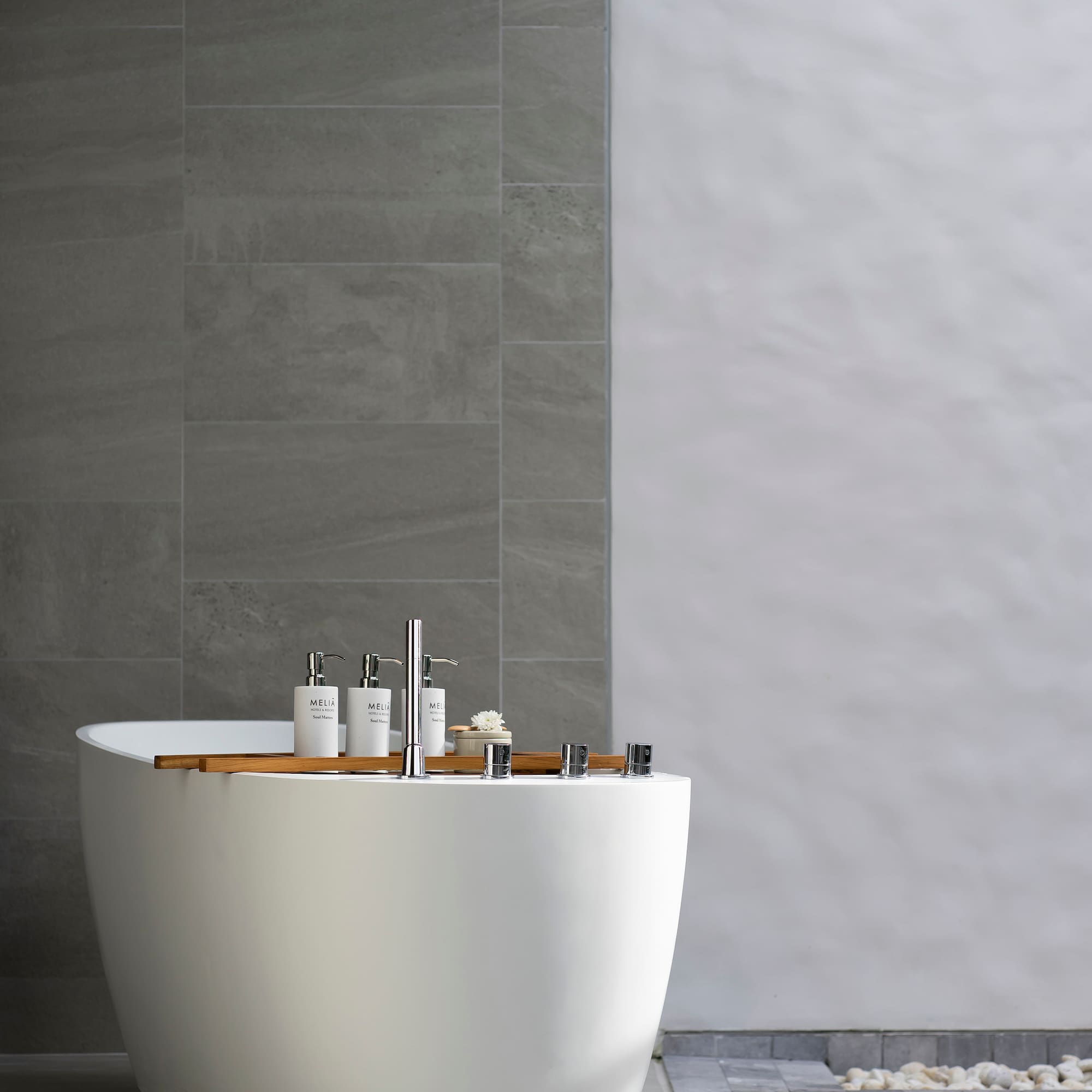 a bathtub with white tub and white walls