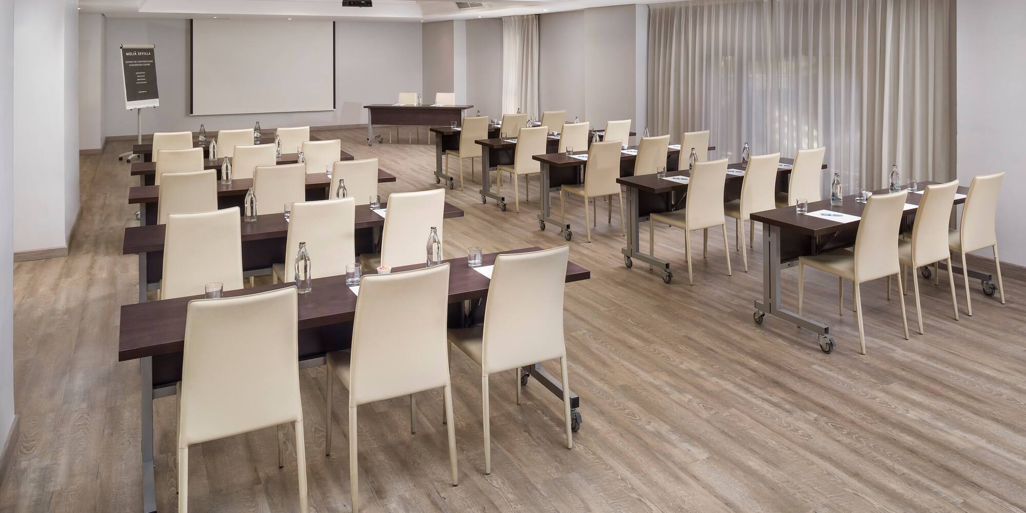 a room with tables and chairs