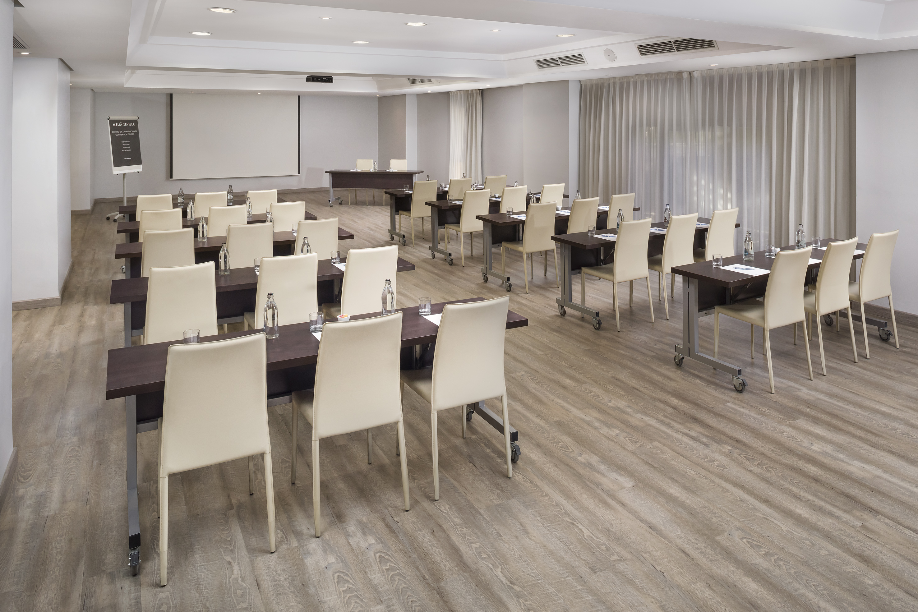 a room with tables and chairs