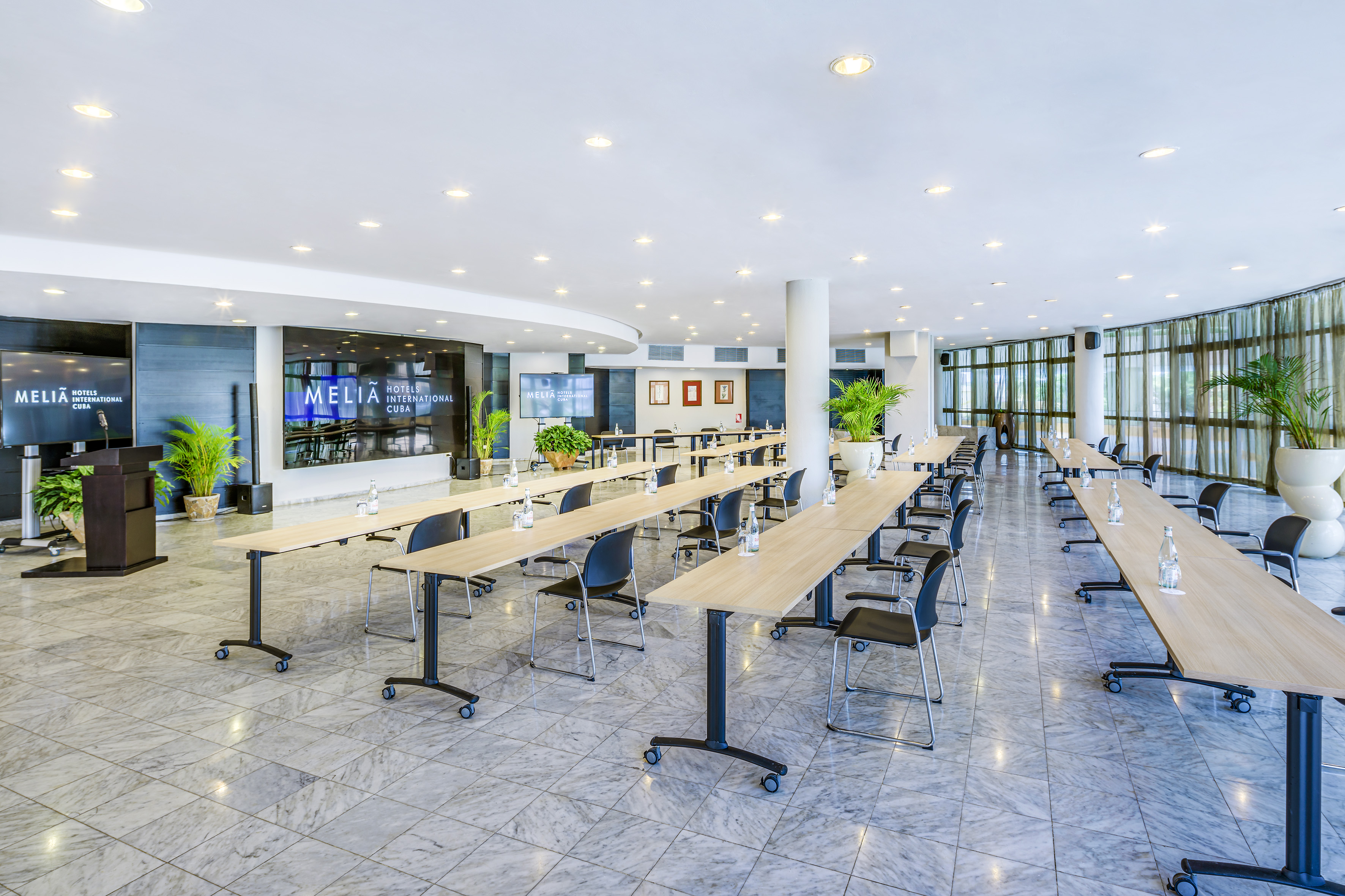 a large room with tables and chairs