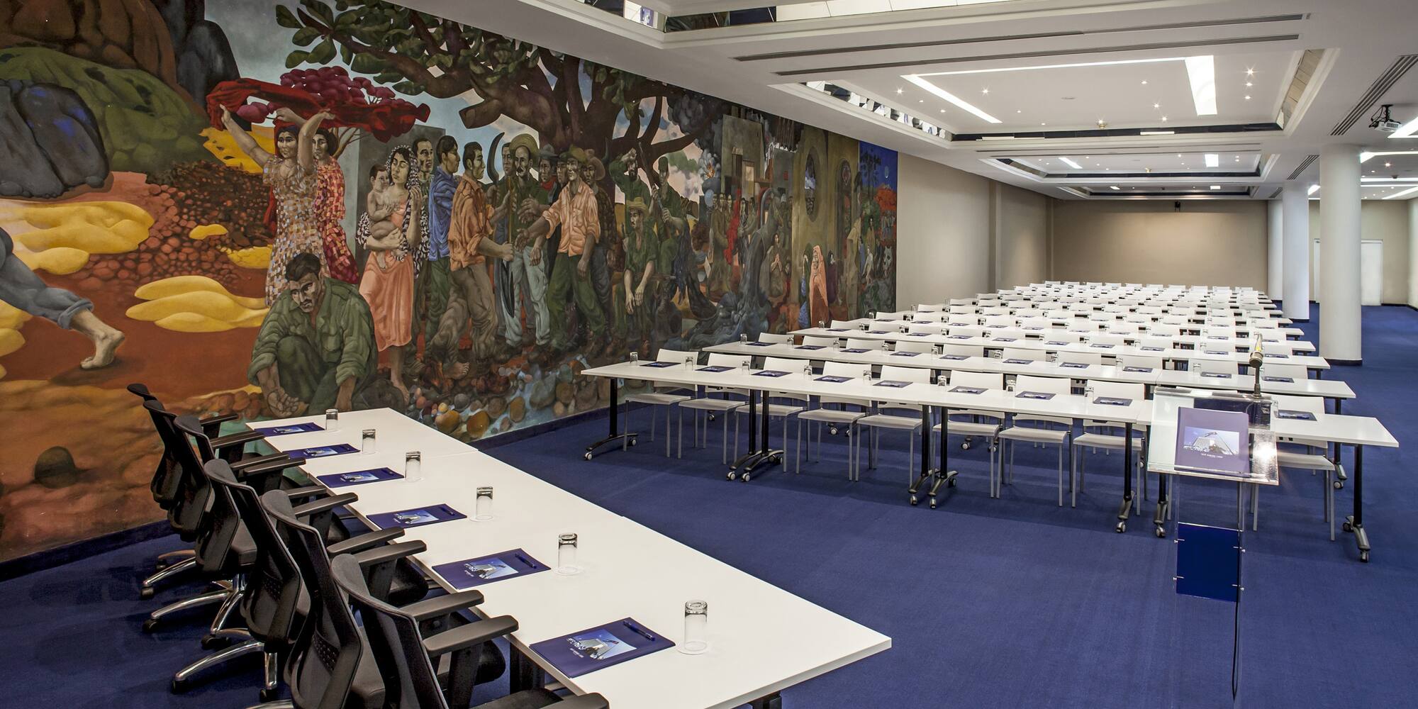 a room with tables and chairs