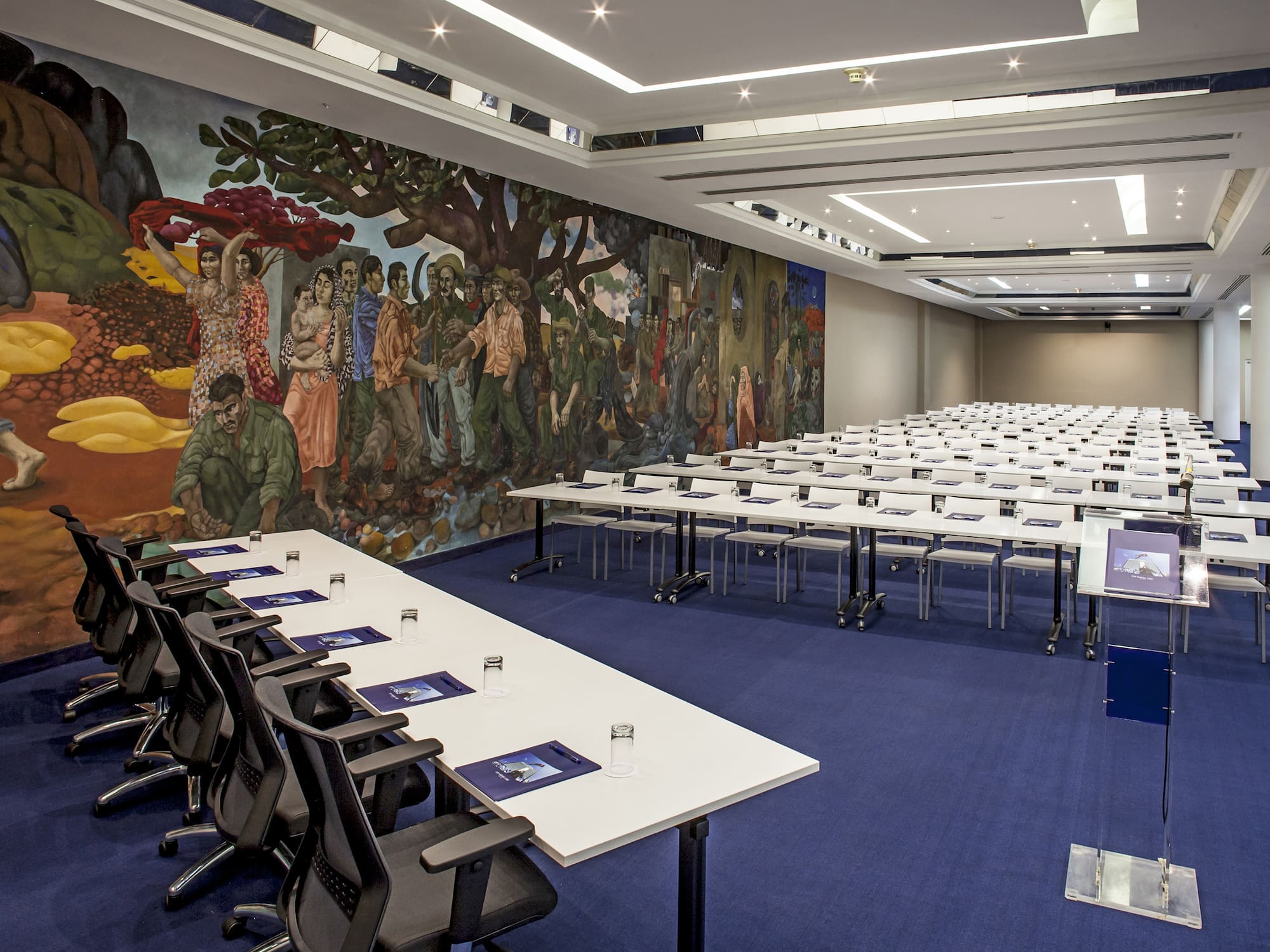 a room with tables and chairs