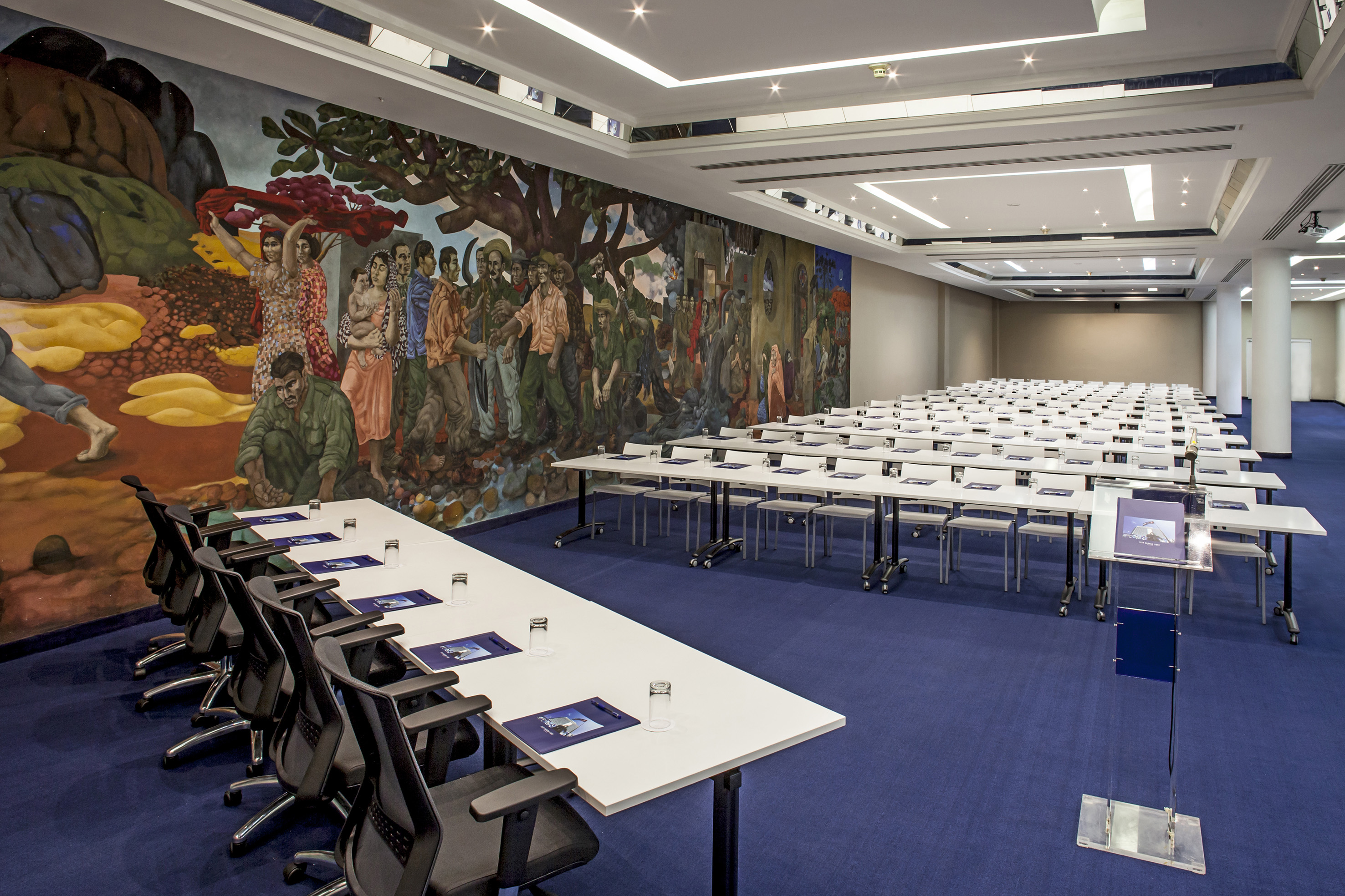 a room with tables and chairs
