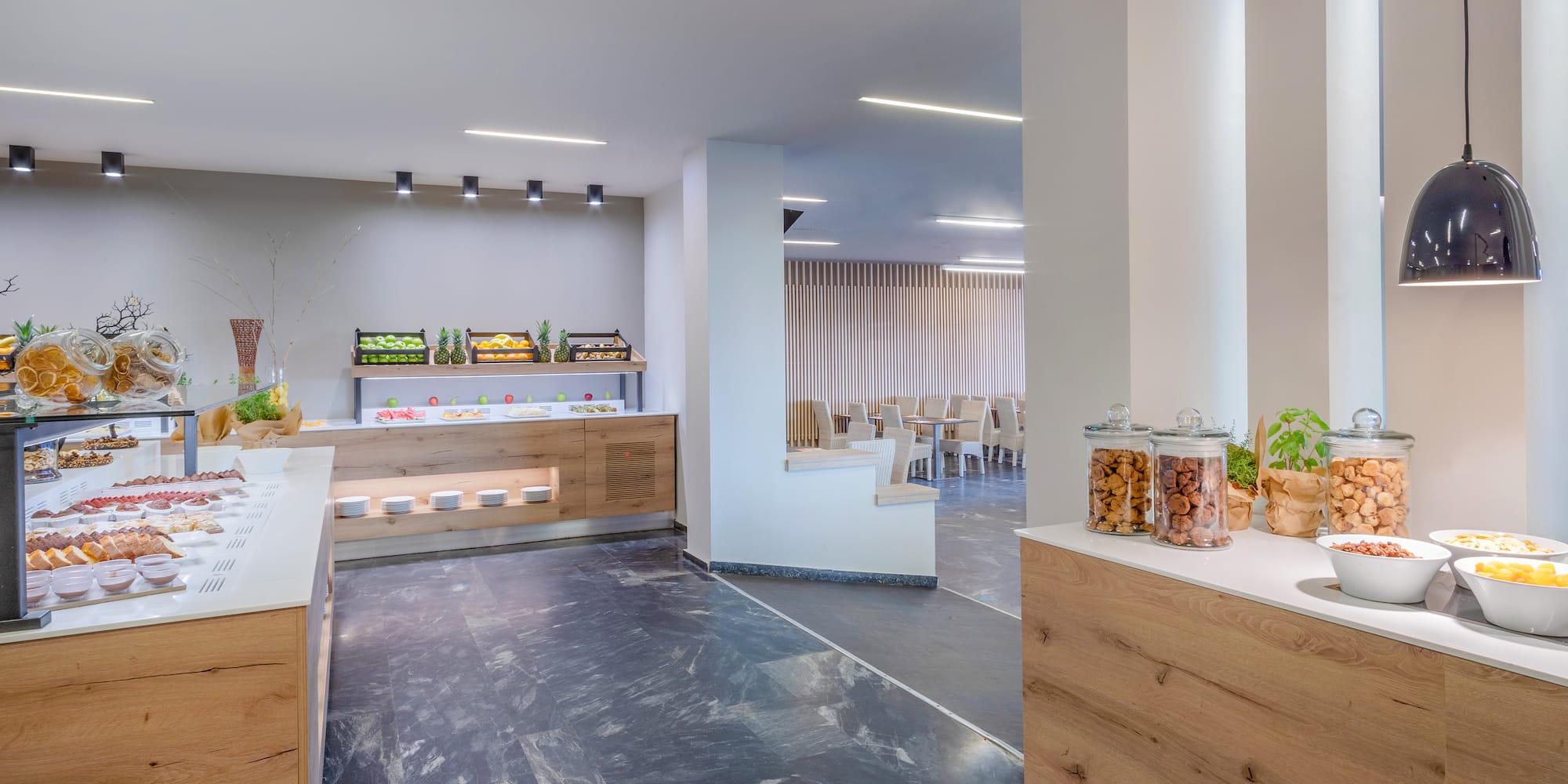 a room with a counter and a buffet