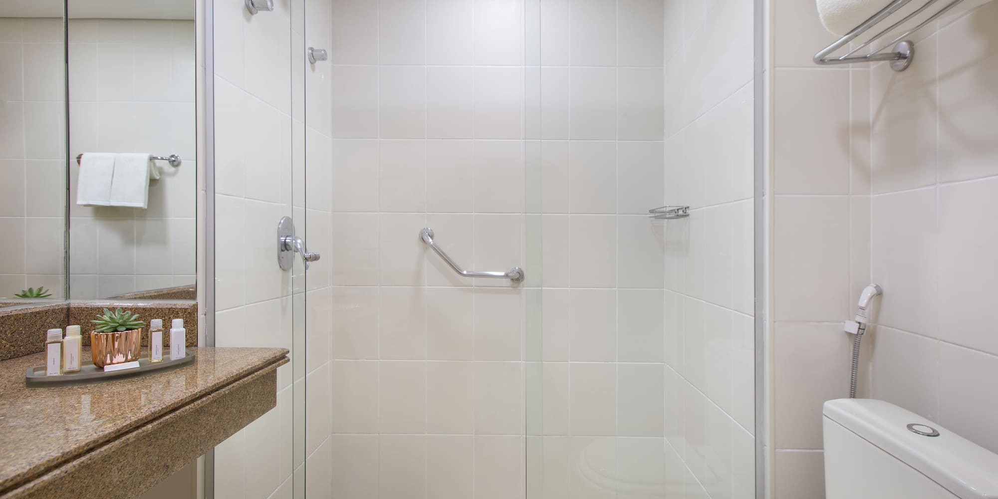a bathroom with a glass shower