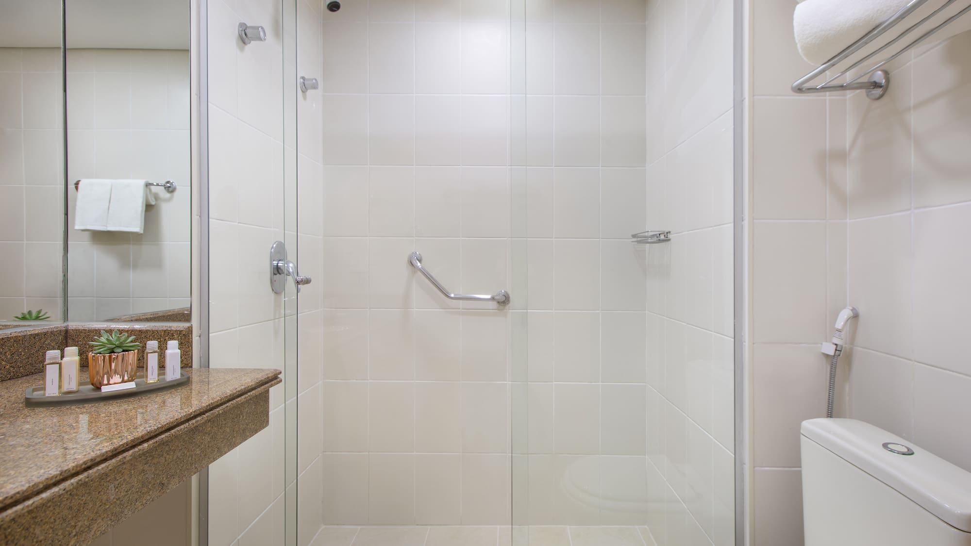 a bathroom with a glass shower