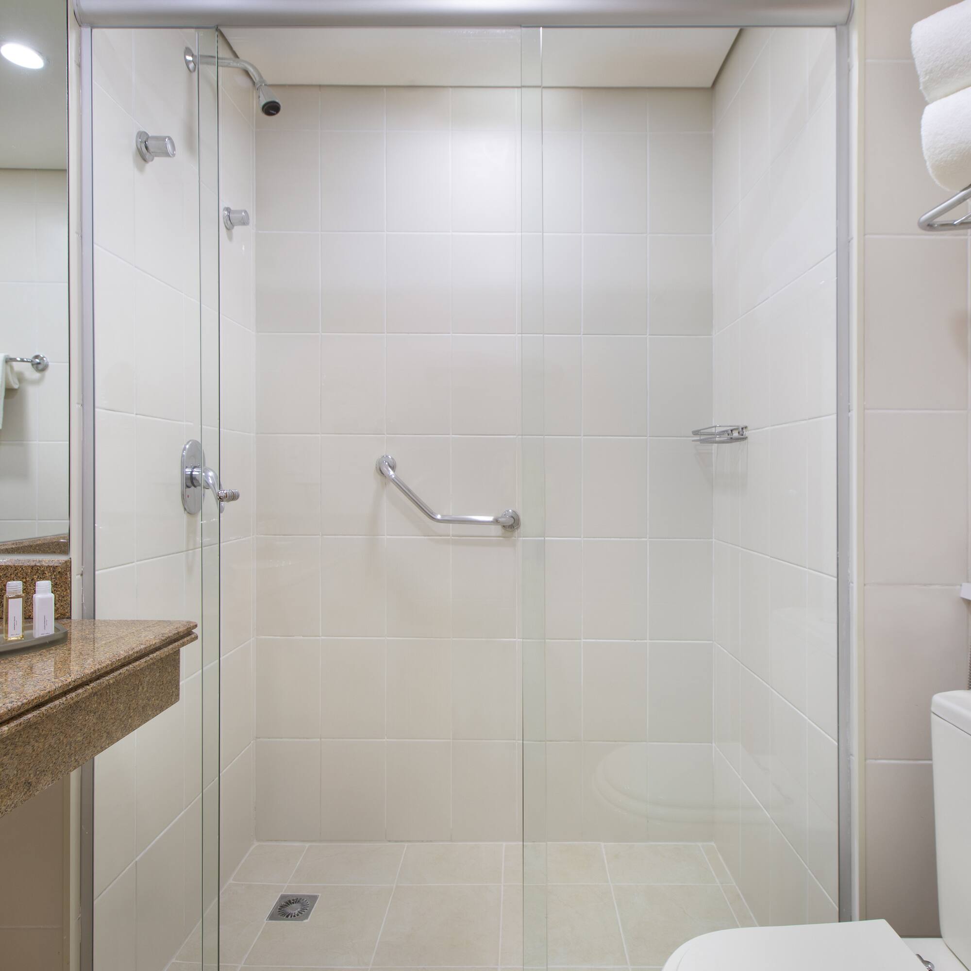 a bathroom with a glass shower