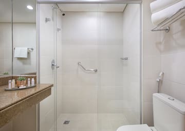 a bathroom with a glass shower