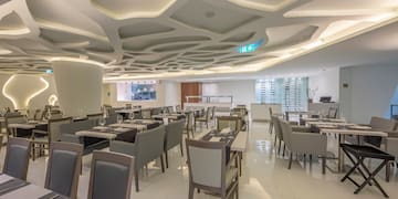 a room with tables and chairs