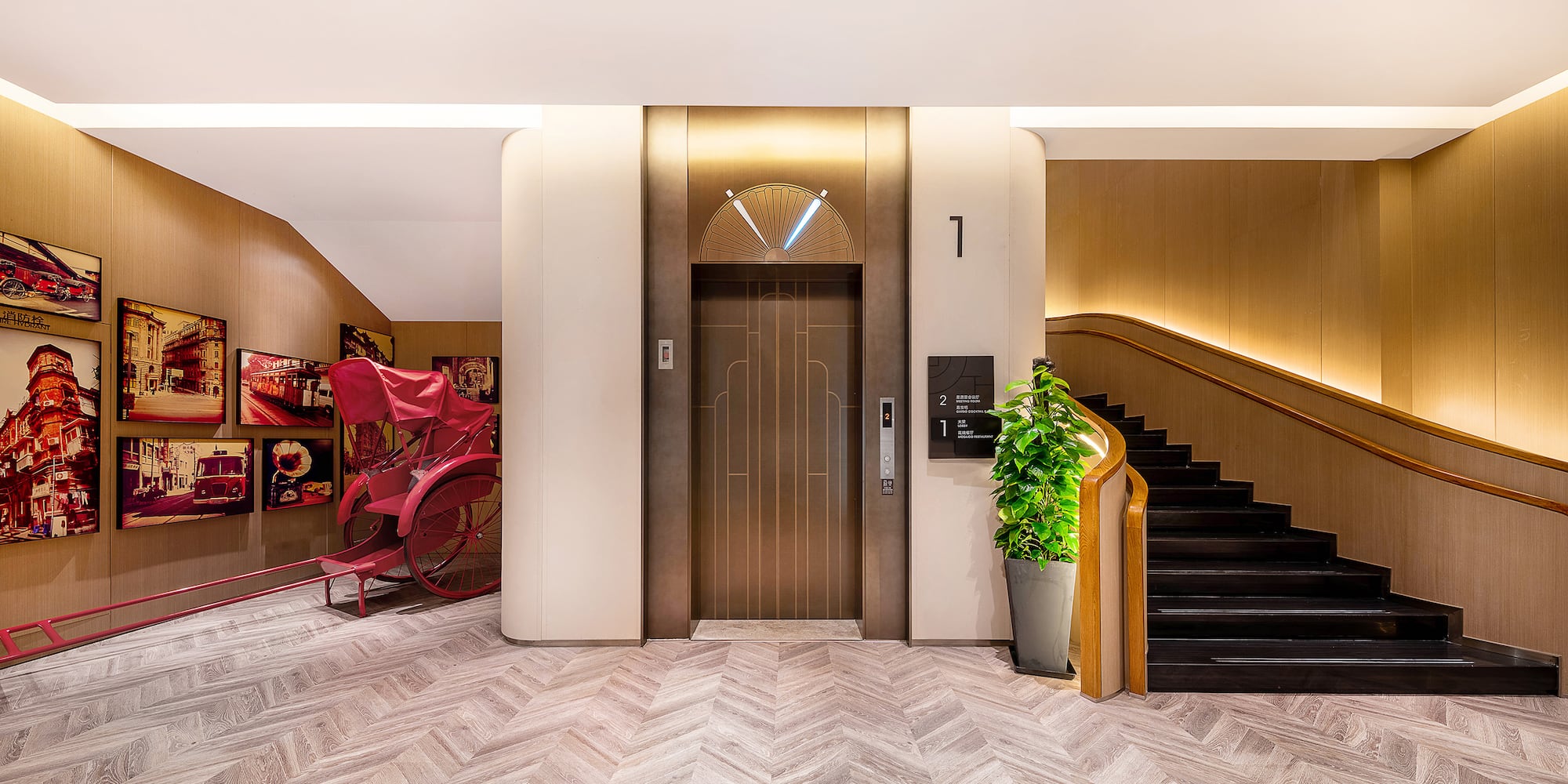 a elevator with a red carriage in the middle