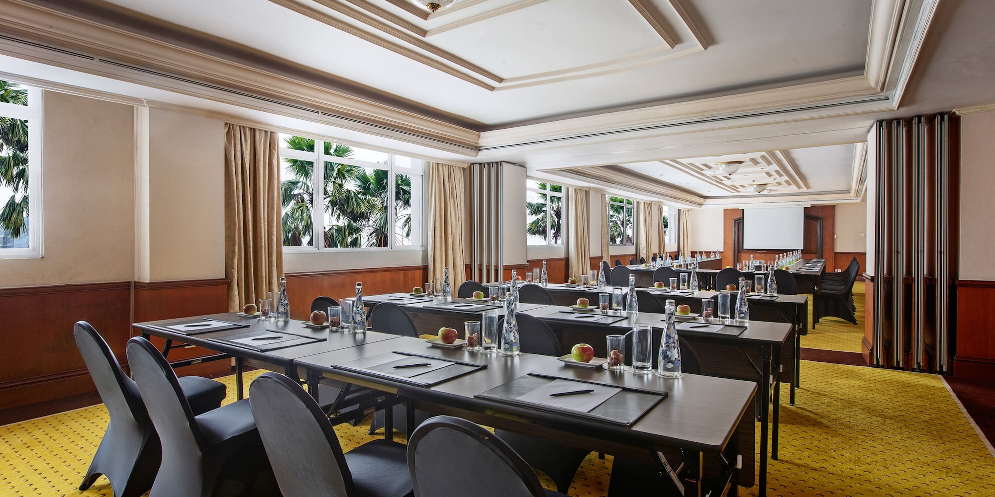 a room with tables and chairs