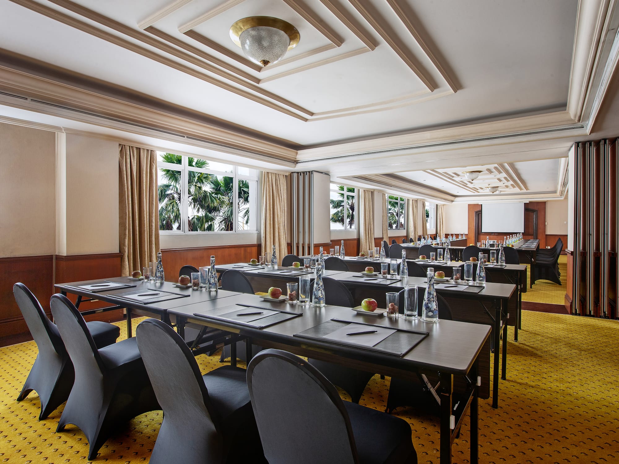 a room with tables and chairs