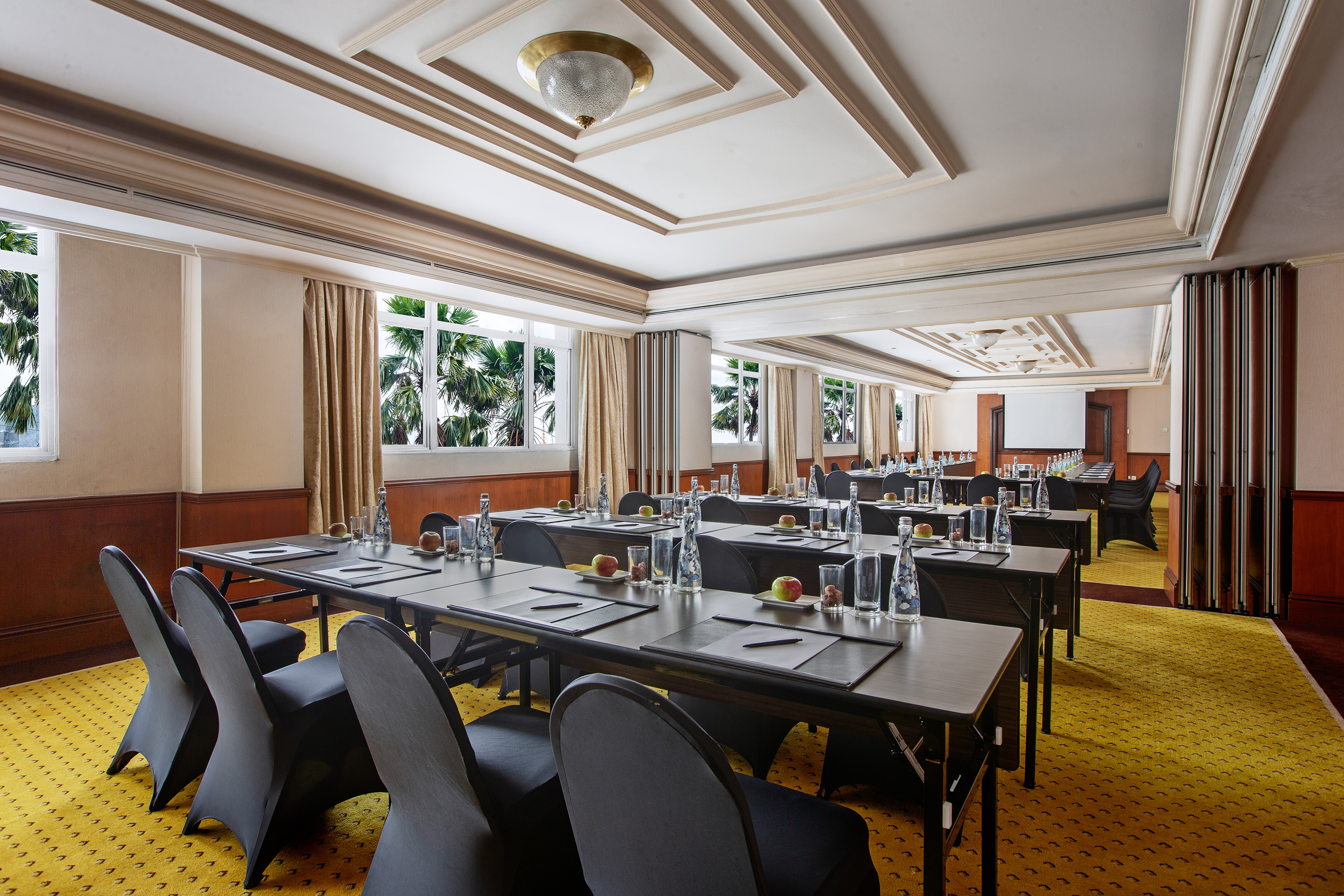 a room with tables and chairs