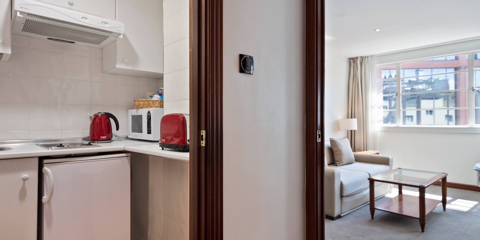 a door open to a kitchen