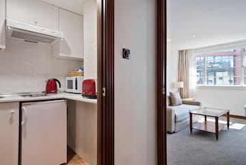 a door open to a kitchen