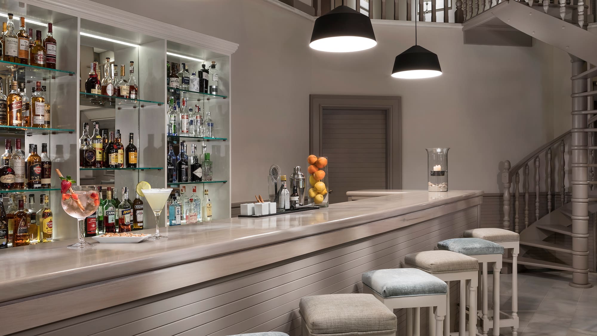 a bar with a shelf of liquor