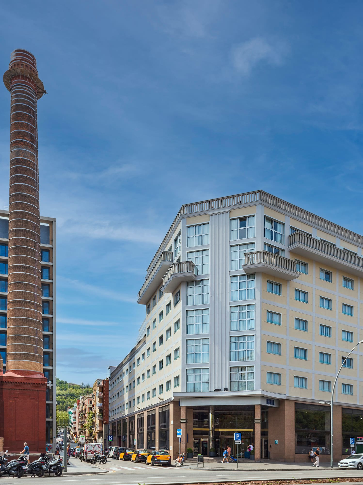 a street with buildings and a tall tower