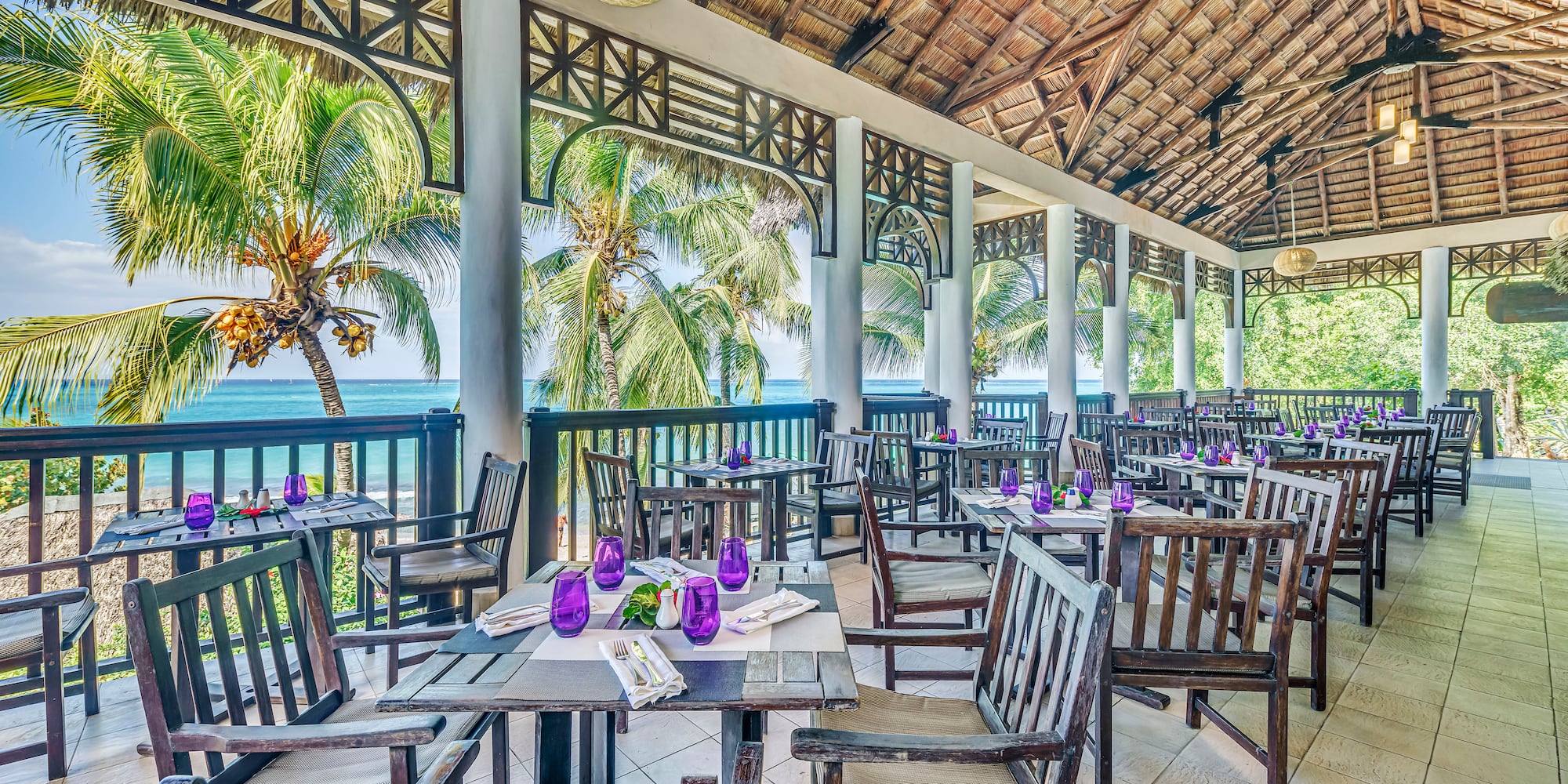 a restaurant with tables and chairs