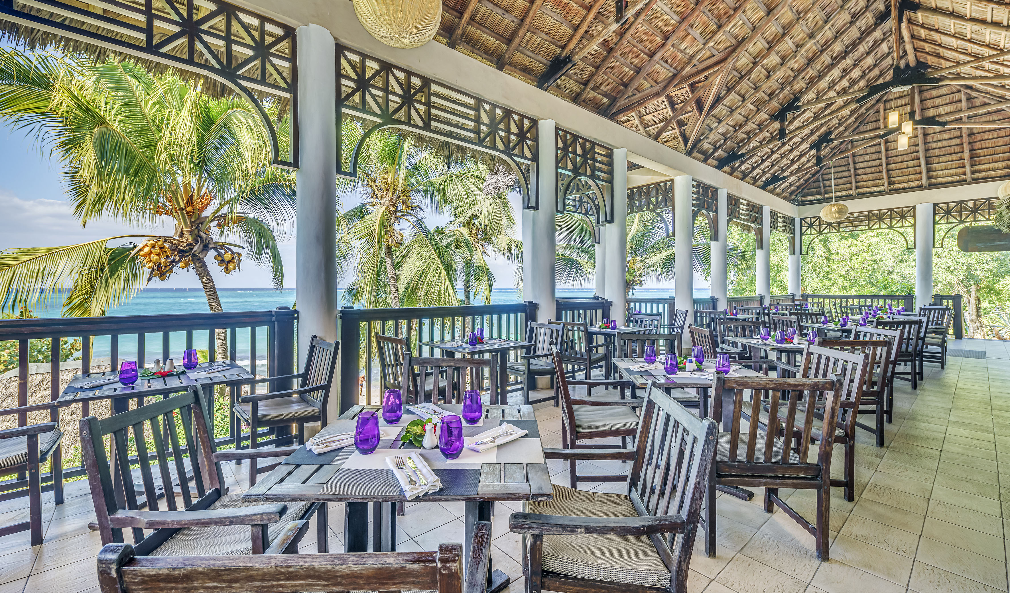 a restaurant with tables and chairs