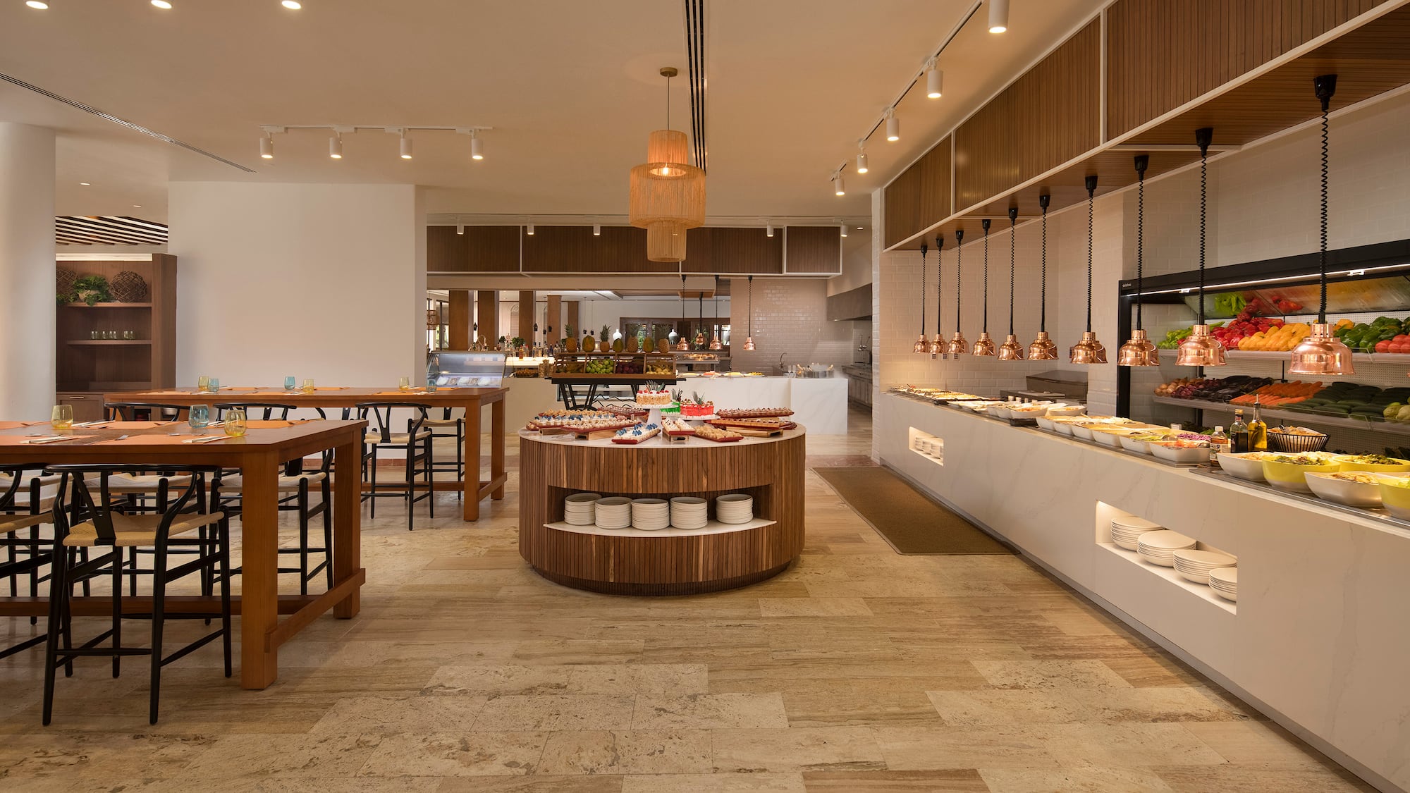 a restaurant with food on the counter