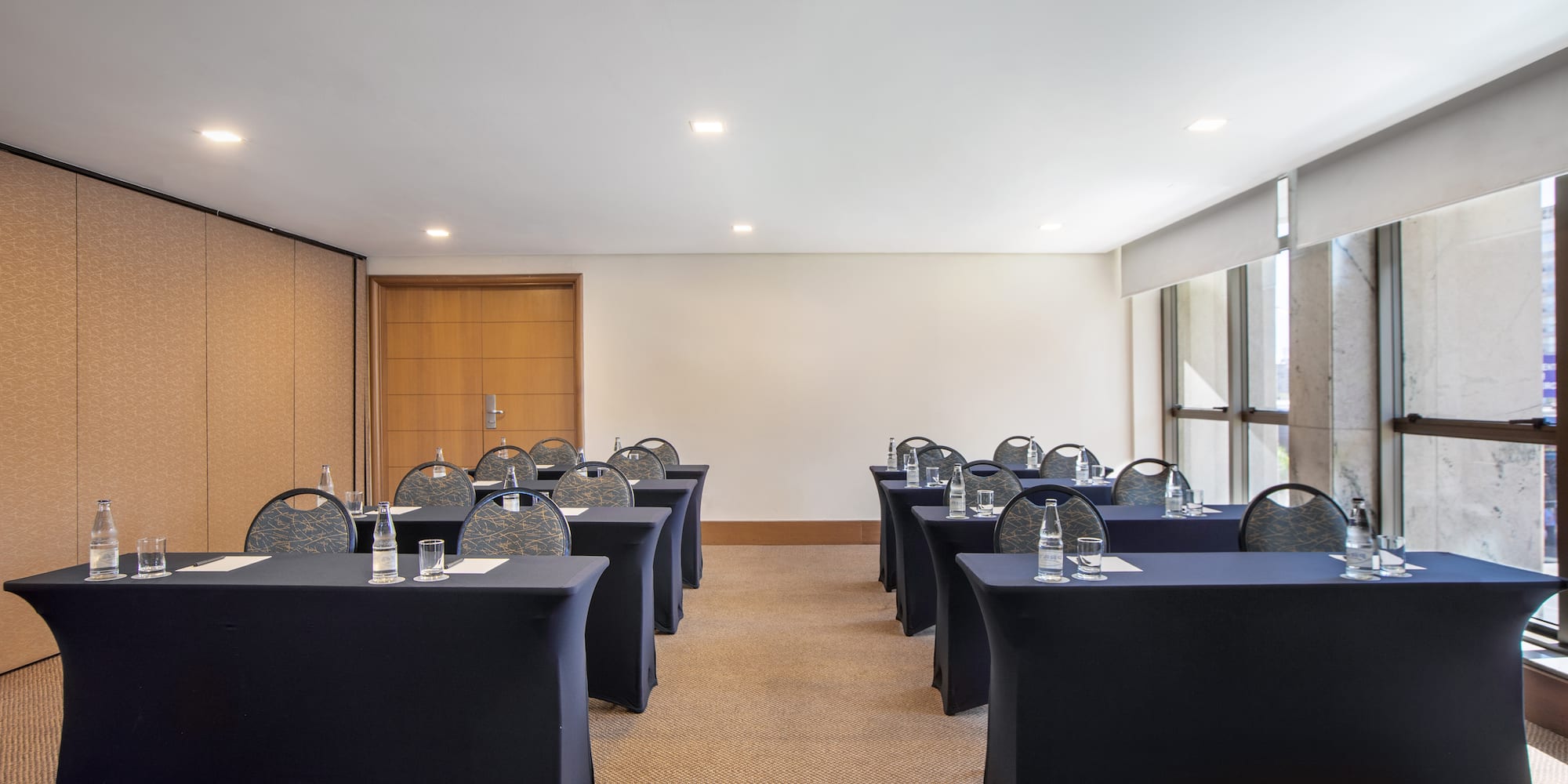 a room with tables and chairs