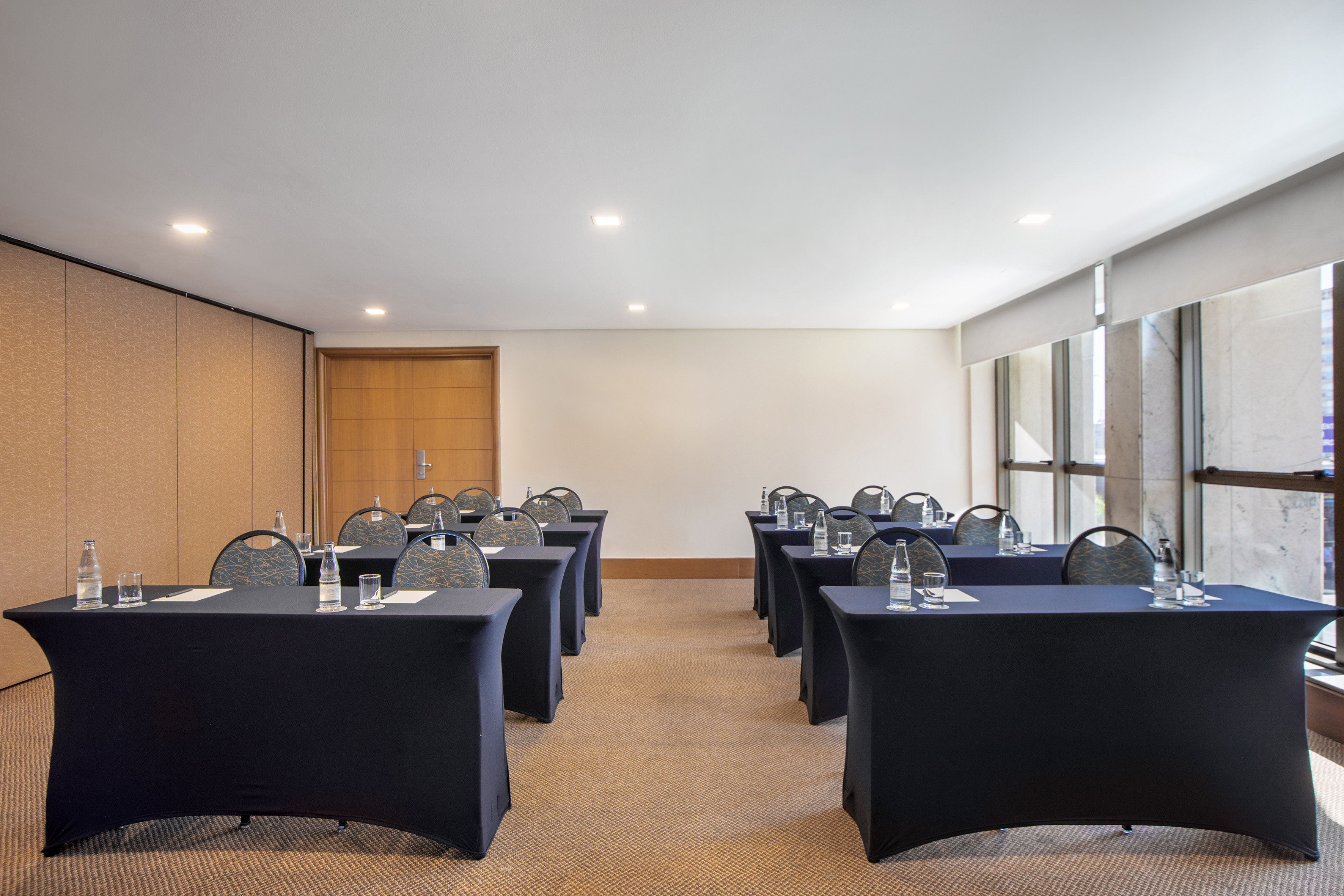 a room with tables and chairs