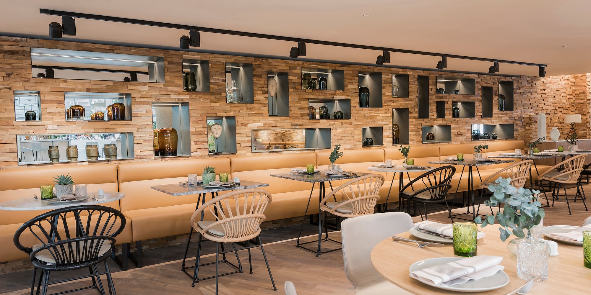 a restaurant with tables and chairs