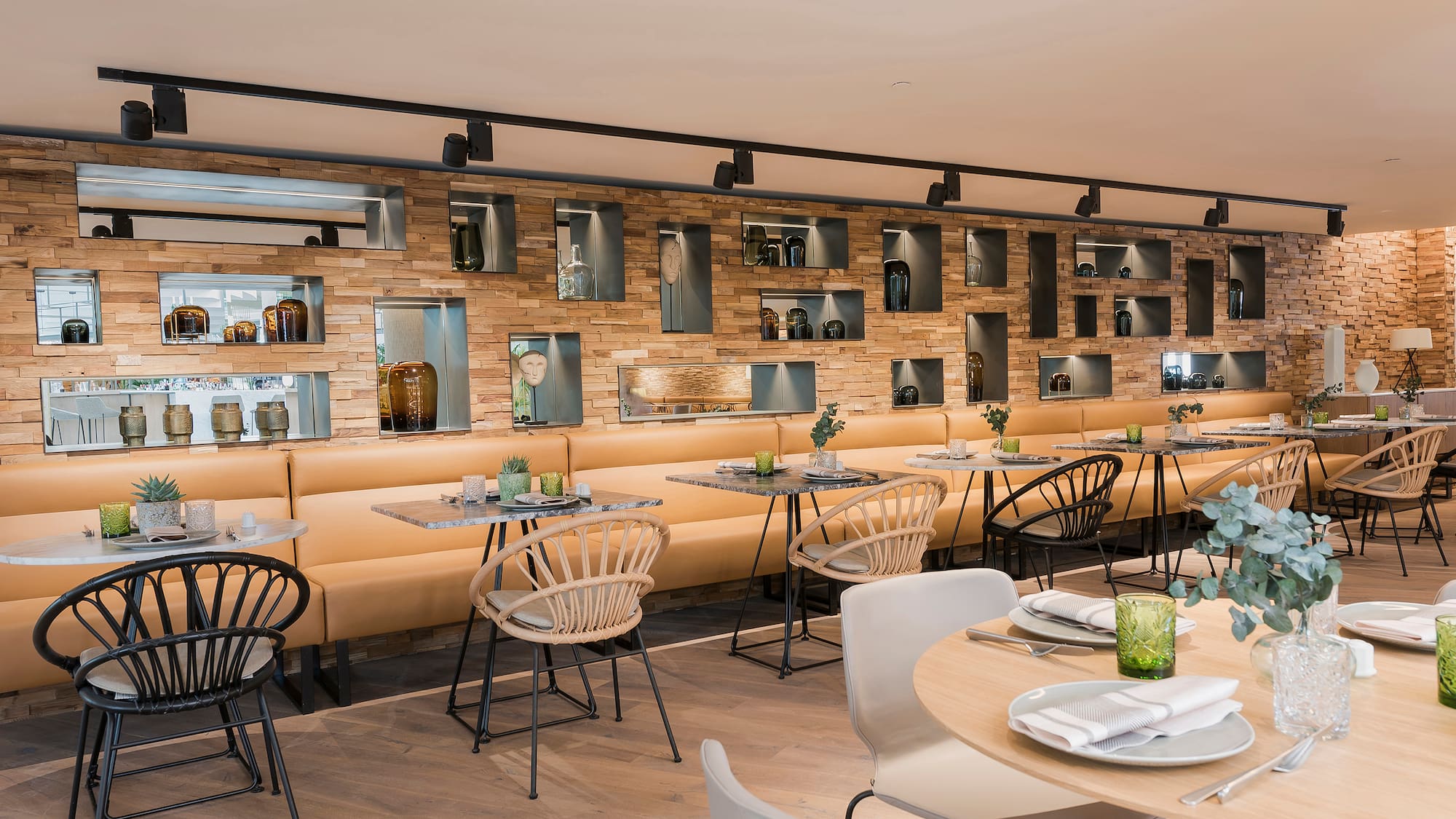 a restaurant with tables and chairs