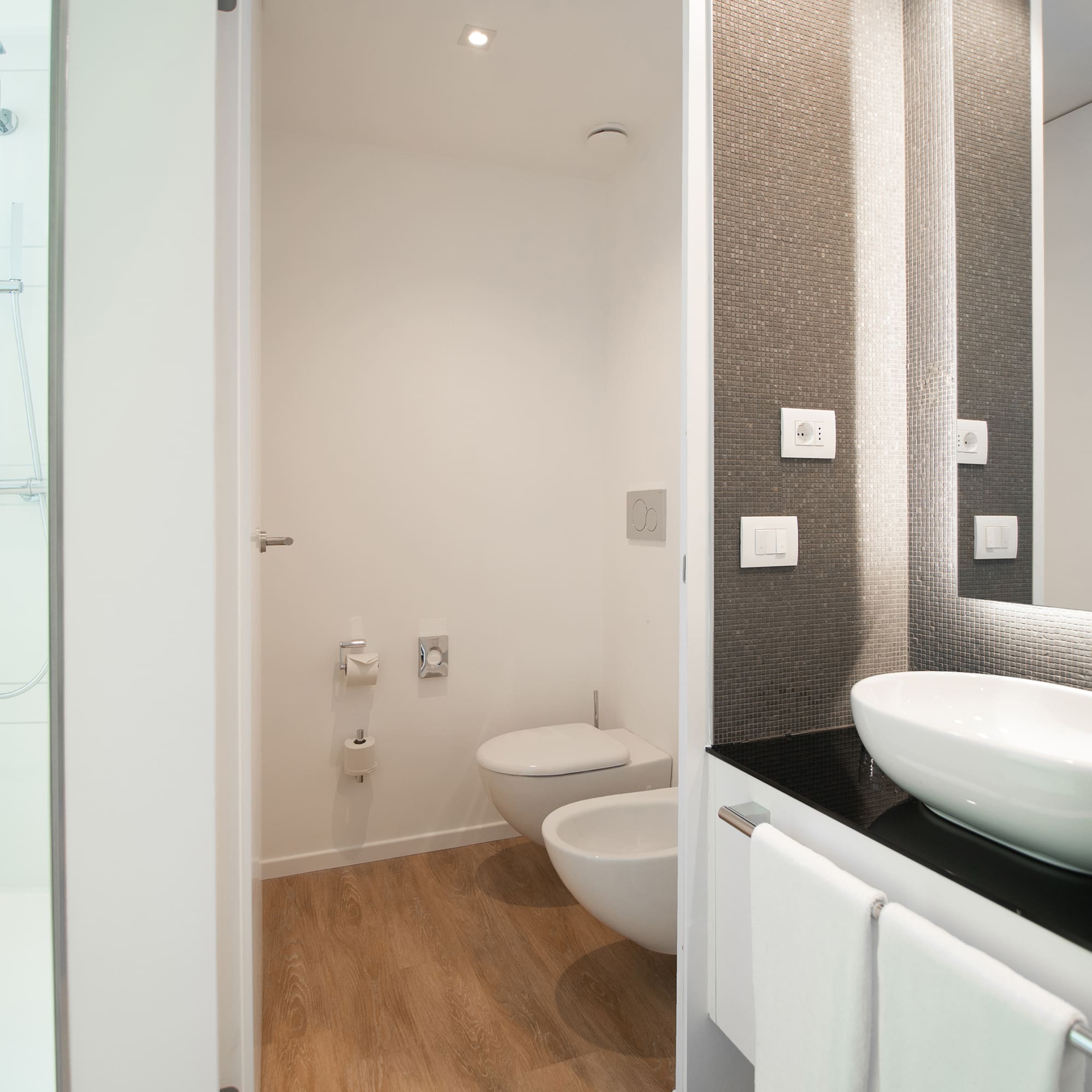 a bathroom with a sink and toilet