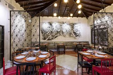 a room with tables and chairs