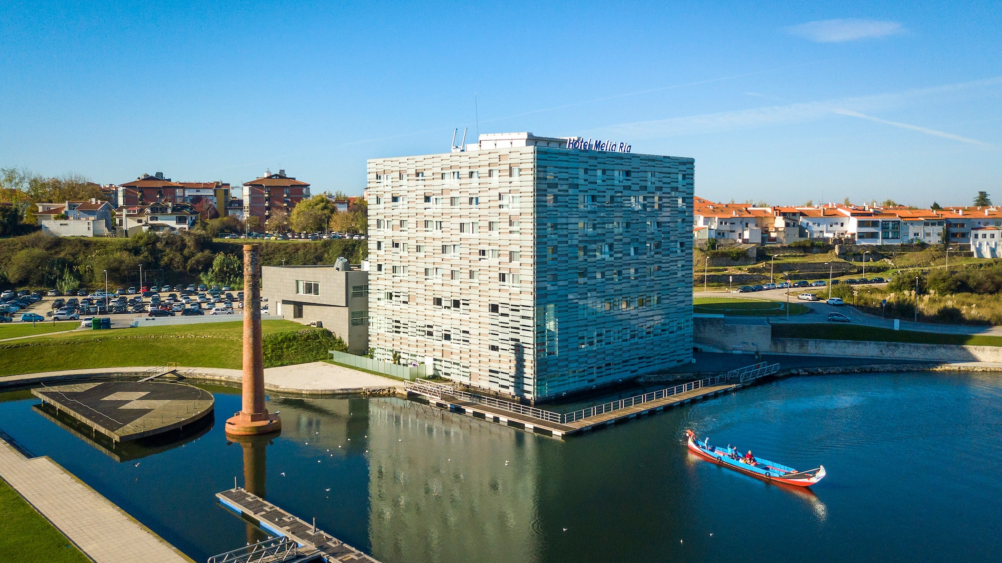 a building next to a body of water