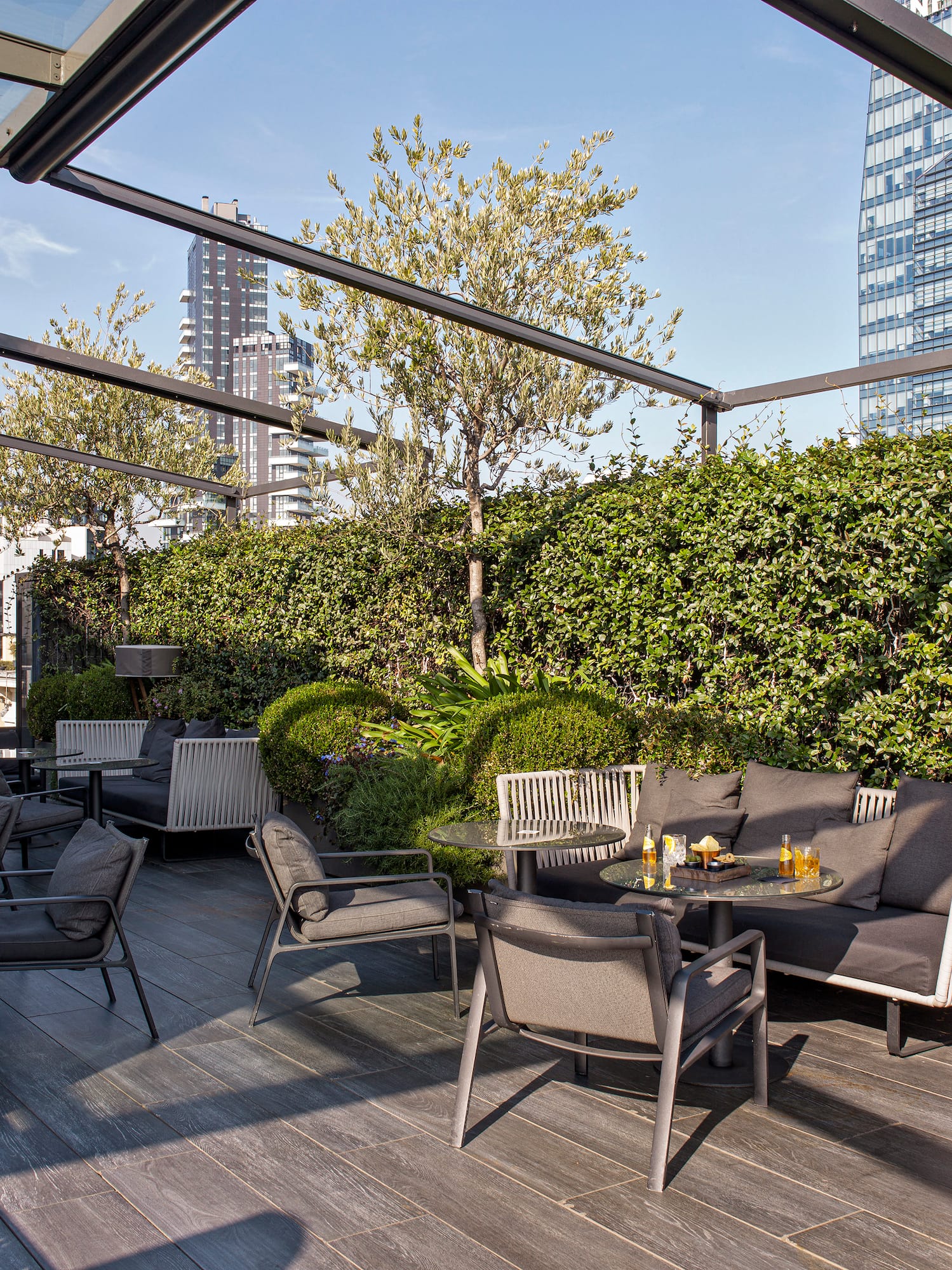 a patio with a table and chairs
