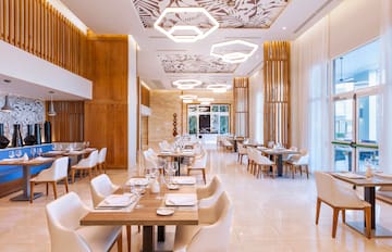 a room with tables and chairs