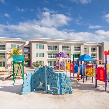 a playground in front of a building