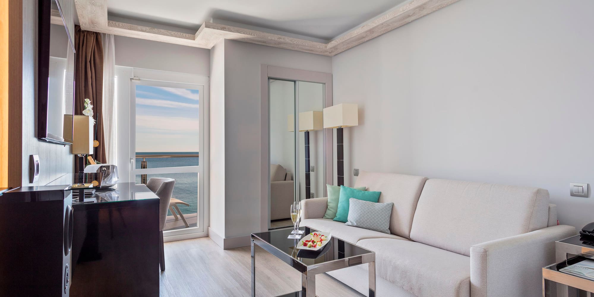 a living room with a couch and a table