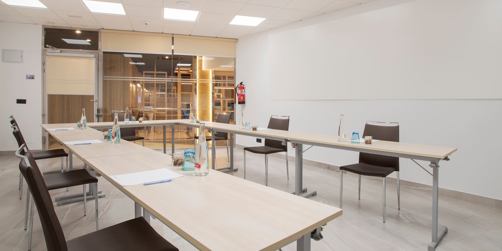 a room with tables and chairs