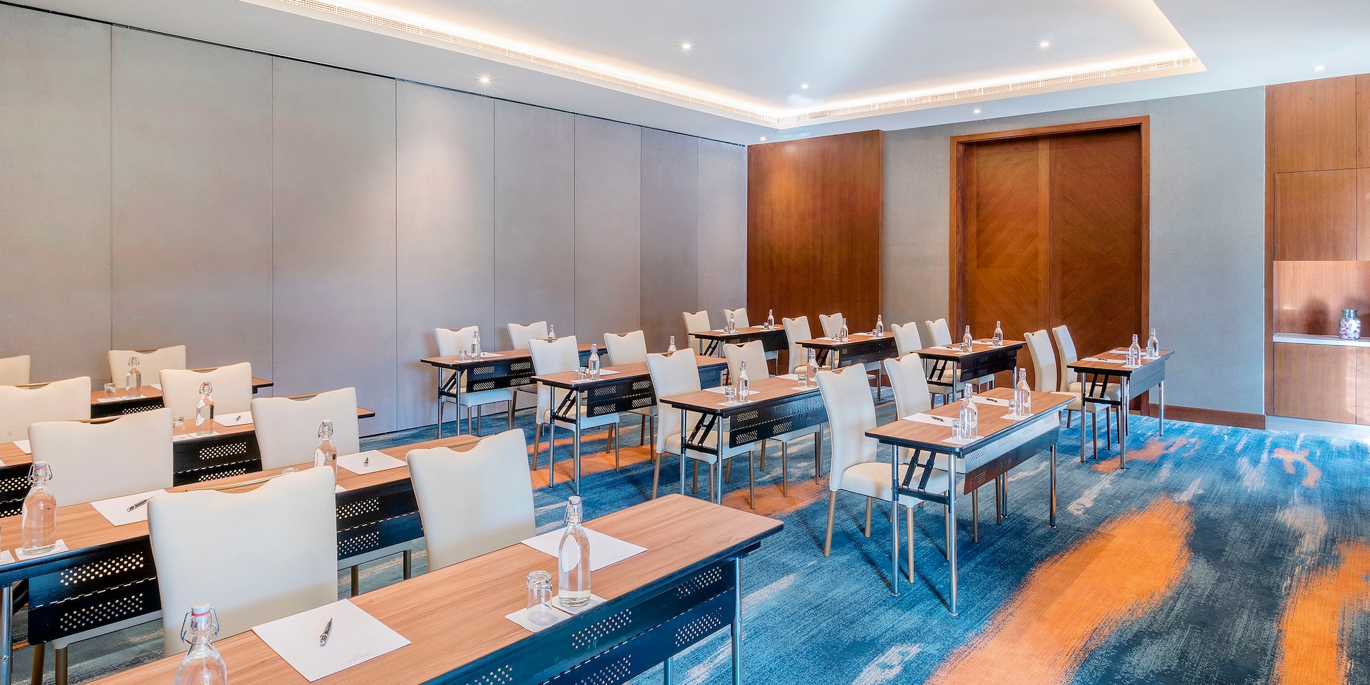 a room with tables and chairs