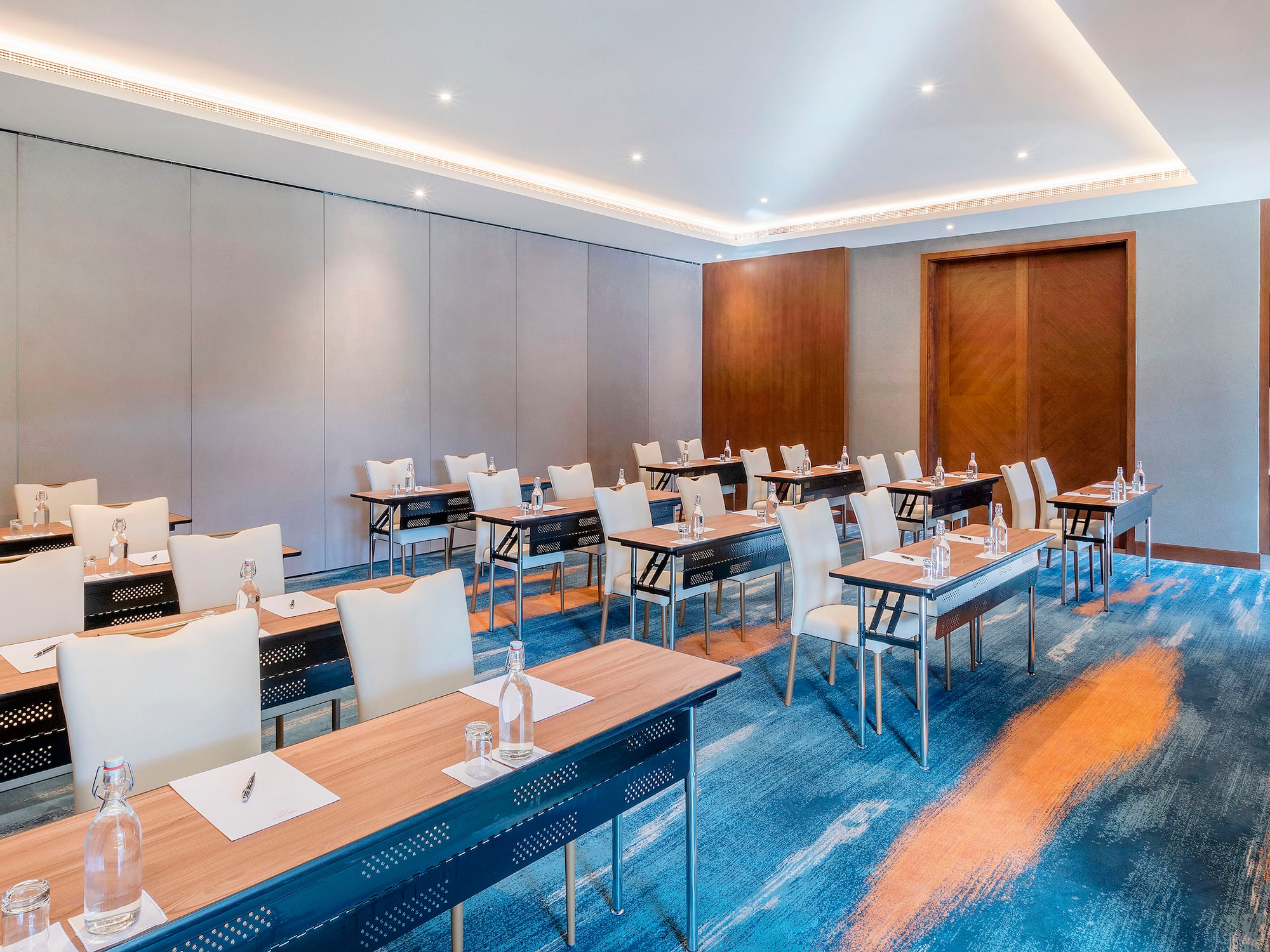 a room with tables and chairs