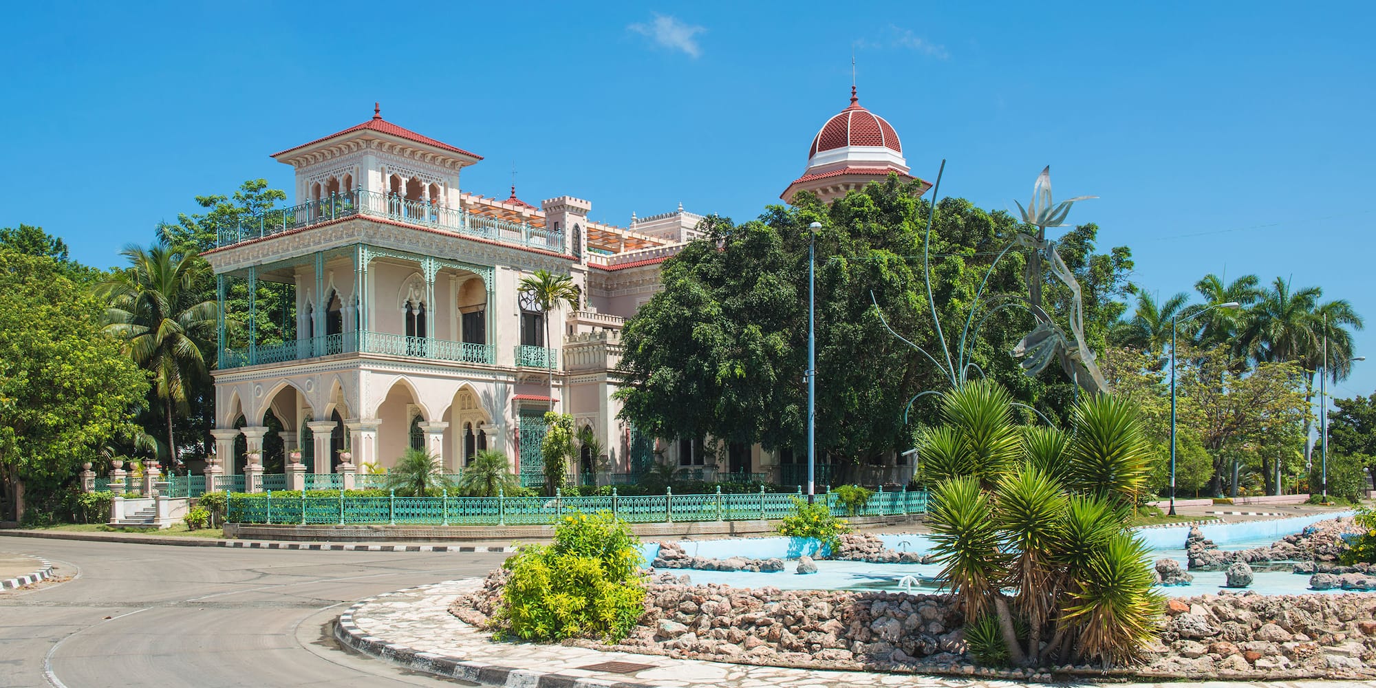 a building with a fountain in front of it