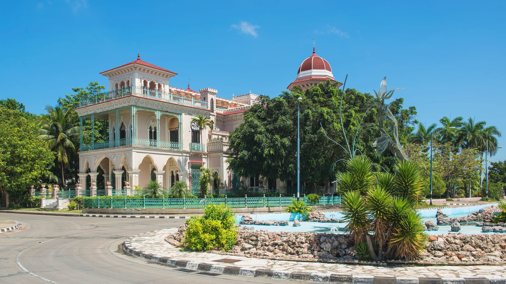 a building with a fountain in front of it