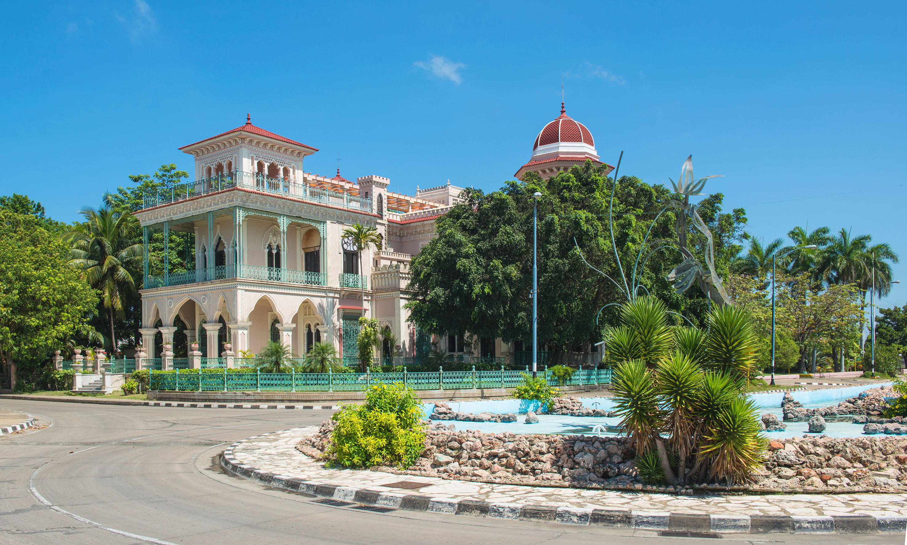 a building with a fountain in front of it
